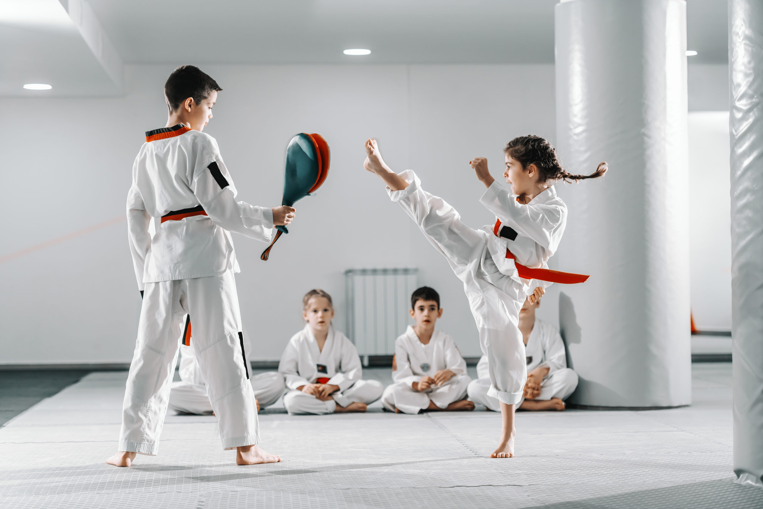 Caucasain,Boy,And,Girl,In,Doboks,Having,Taekwondo,Training,At